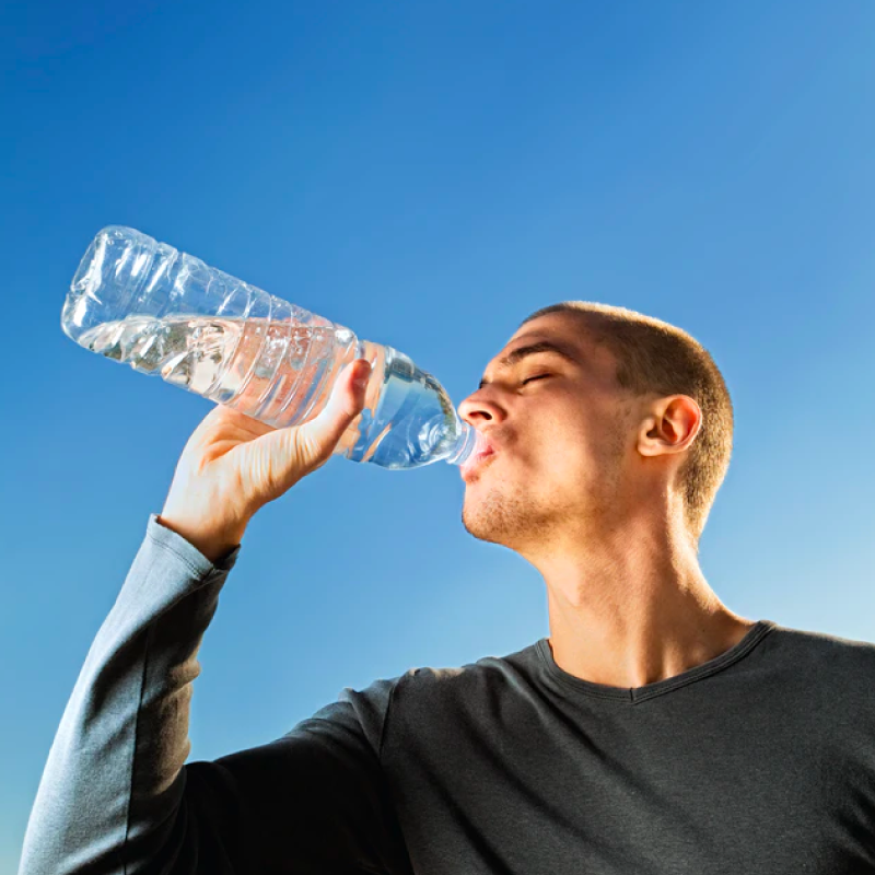 guy drinking alkaline water